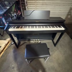 Roland RP 750 Digital Piano like new still tags $1400 new at Costco