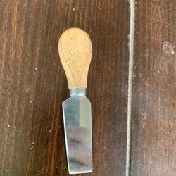 Vintage wood handle cheese knife