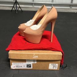 Woman’s Christian Loubotin Size 6W