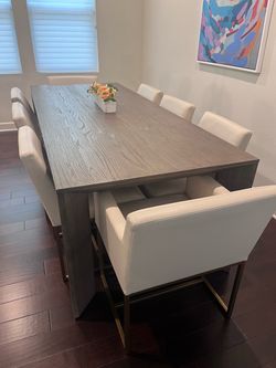 RH dining table and leather chairs