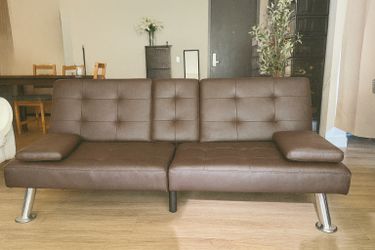 Brown Futon Sofa Bed Faux Leather- yes it’s available