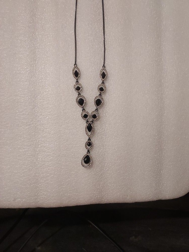 Embolden your neckline with the shapely design and sparkle of Givenchy's lariat necklace.

Product Features
Approx. length: 16" + 3" extender; approx.