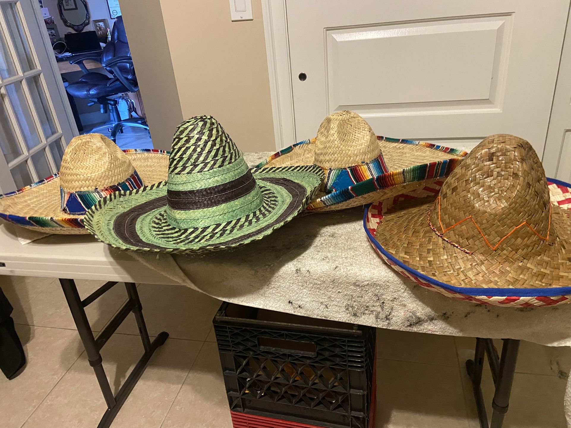 Four Mexican Straw Sombreros