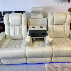 Like New Leather Electric Dual Reclining Couch With Electric Headrests And Dual USB And Led Lighting 
