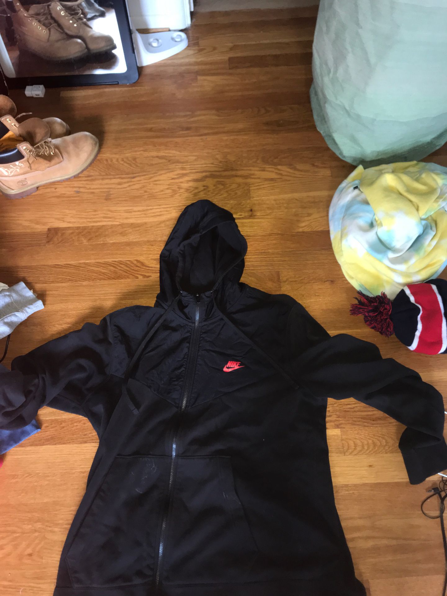 XL can fit large black nike hoodie. Got it for 110$