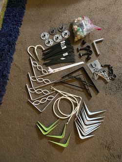 Lot of shelf brackets, drawer knobs, curtain rod hardware