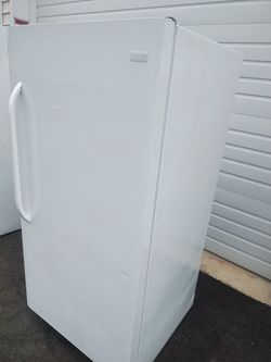 30 x 62 inch tall freezer good working