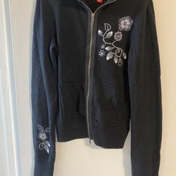 1151 Ladies Preowned Mossimo Black Decorated Sweater Size M. $5.00