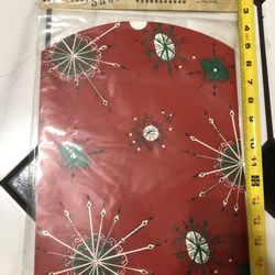 This is an Old Navy Supply Co. Deluxe Gift Box/Tree Skirt packaging.  Brand: Old Navy Supply Co. Item: Deluxe Gift Box / Good Cheer item Size: 10.75" 