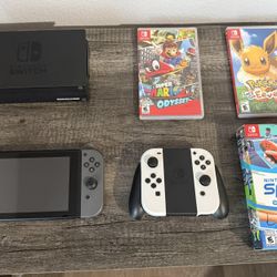 Nintendo Switch Bundle – Extra Controllers + 3 Games