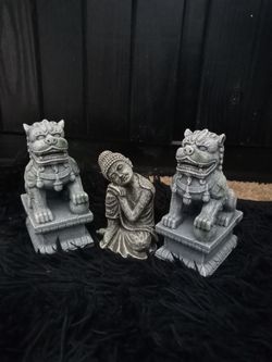 Three spiritual small statues