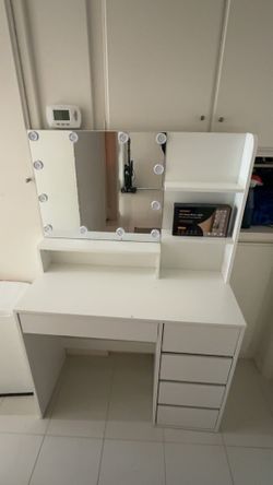 White vanity with lights