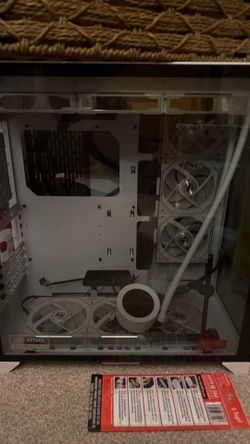 Lion li case, 360mm nzxt lcd kraken aio, 10 lion li case fans and a 1200w corsair psu