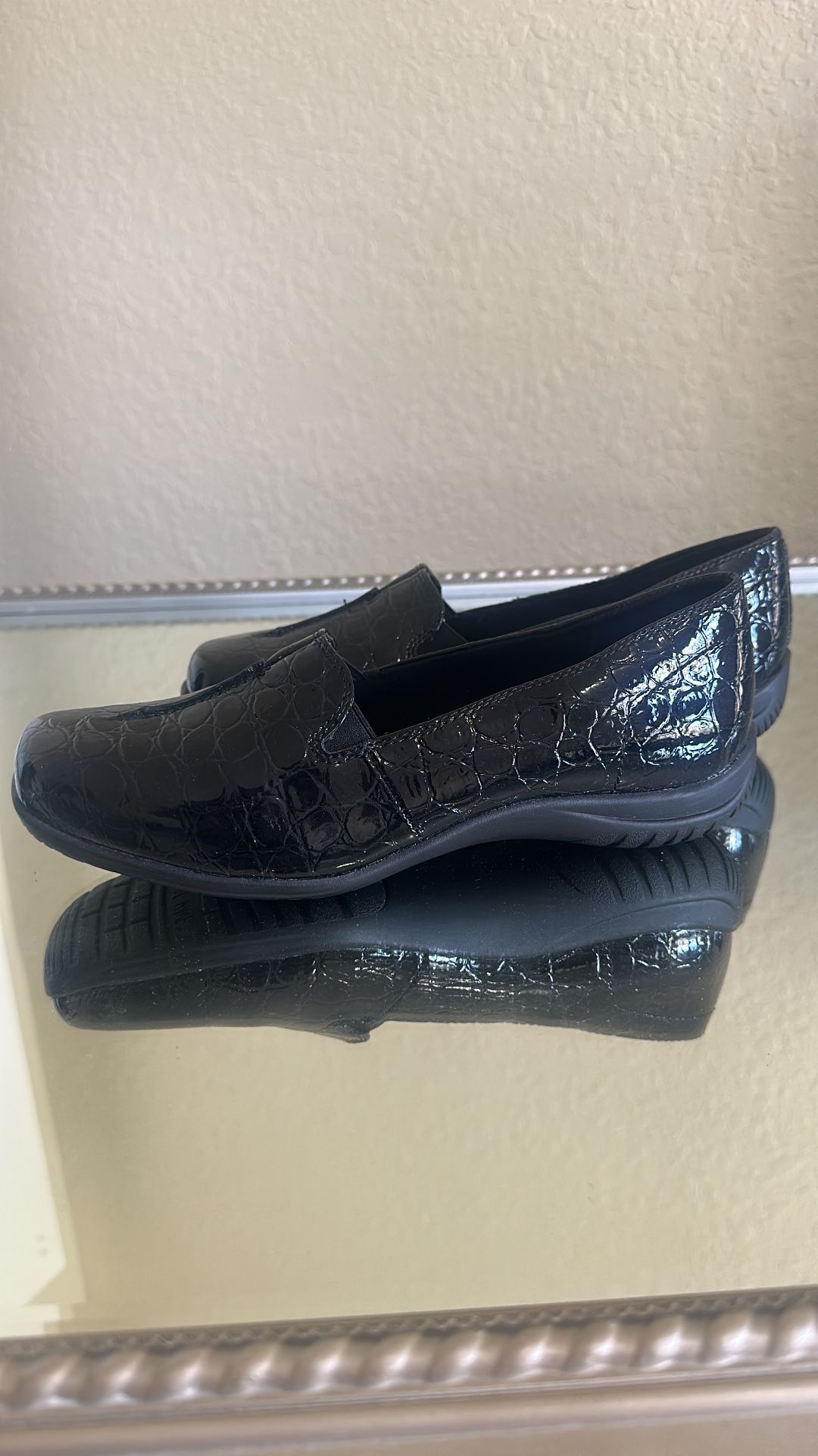 Black varnished shoe