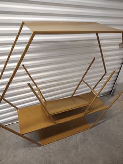 Gold tone display shelf, Sports memorabilia