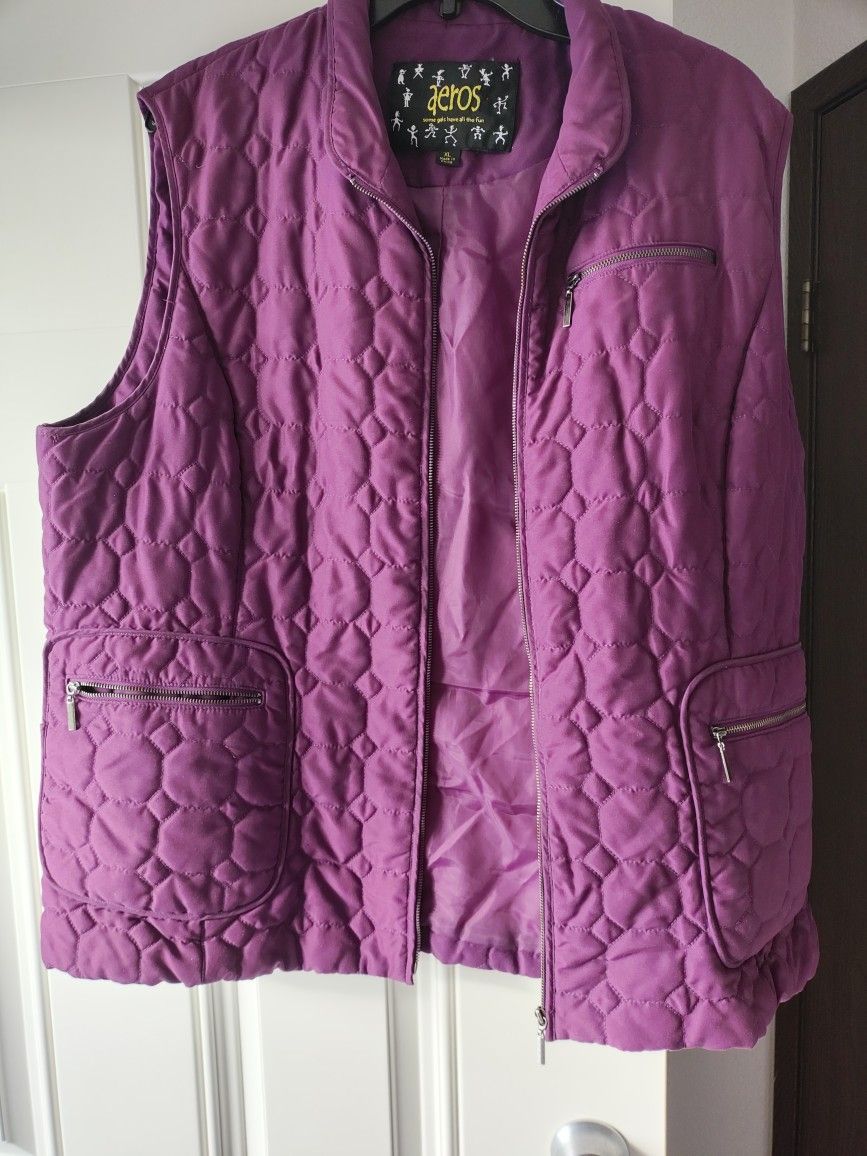Light But Warm Vest With front Zip Pocket. Like New