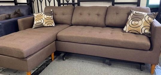 New Poundex reversible sectional couch / free delivery