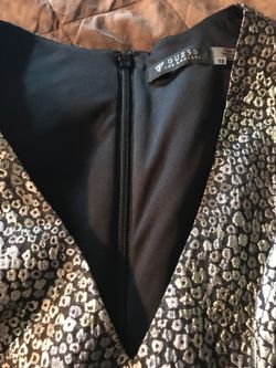 Brand new guess size 12 black and gold dress.