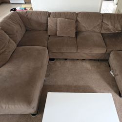 Living Sofa With Ottoman And 2 Pillows.