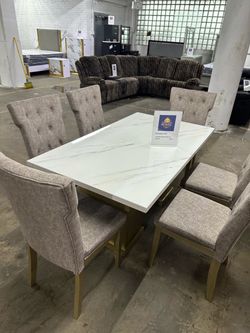 Dining table and 6 chairs
