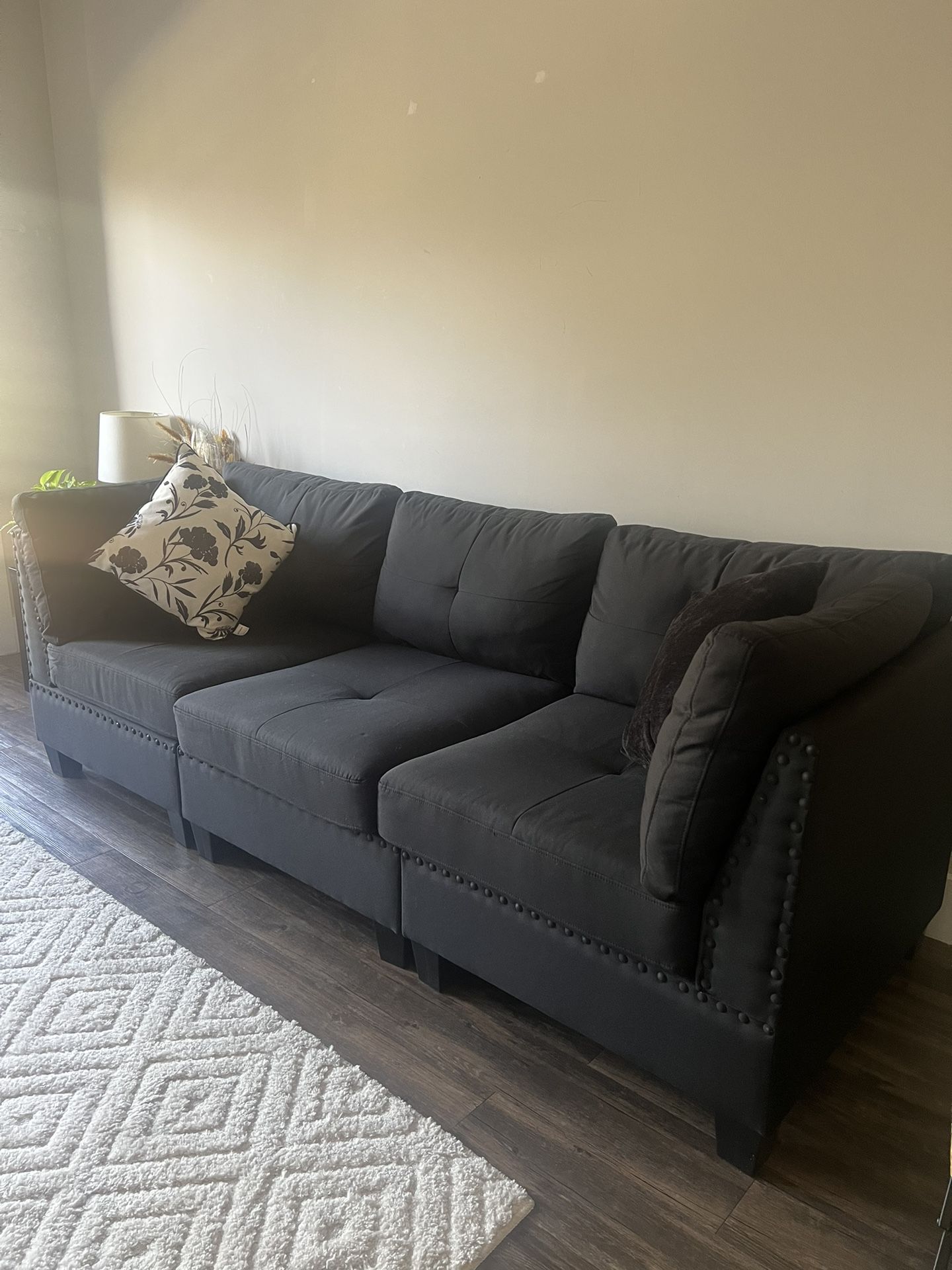 Black Sofa With Movable Ottoman 