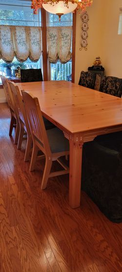 Distressed pine dining table and 8 chairs