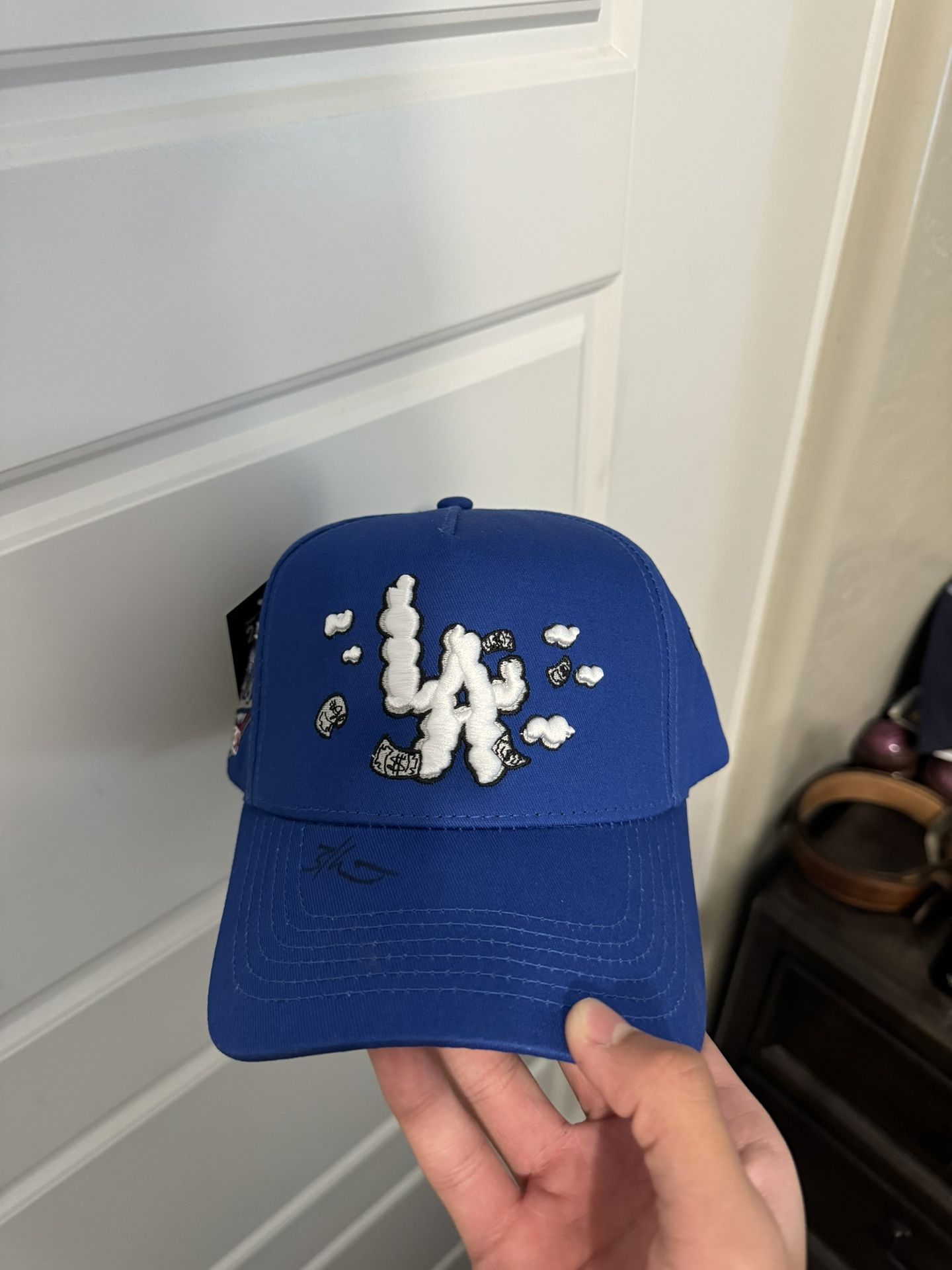31 hats LA clouds signed by 31