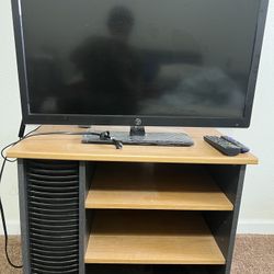 32 Inch Tv With Roku Plug And Play And Voice Remote And Solid Wood Stand 