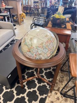 Replogle Regency 16-inch antique floor globe featuring a walnut-finished hardwood stand - small damage on the bottom