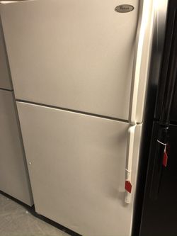 Used whirlpool top and bottom fridge. 1 year warranty