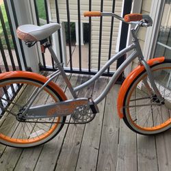 orange huffy cruiser bike