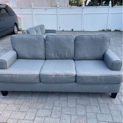 Dark gray couch/sofa