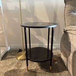 Black side table - gold legs