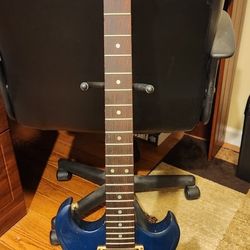 Electric Guitar And 2 Amps