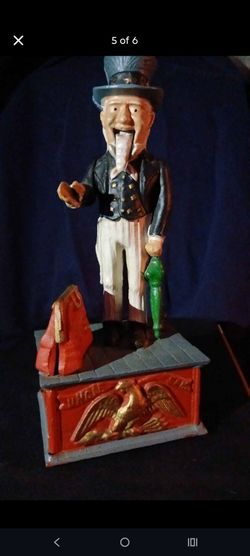 Vintage Uncle Sam cast iron mechanical bank. Great condition!! Works great!!!
