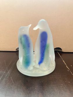 Glass penguin tea light holder