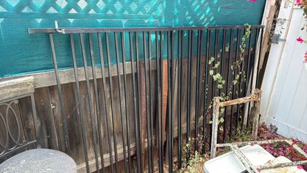 2 6ft black steel gates $100