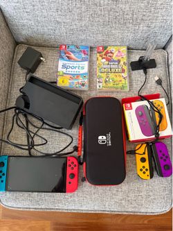 Like new Nintendo Switch OLED with extra