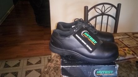 9 1/2 new safety shoes with steel tip, Resistant slip