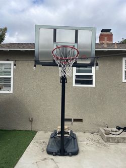 HEIGHT ADJUSTABLE BASKETBALL HOOP