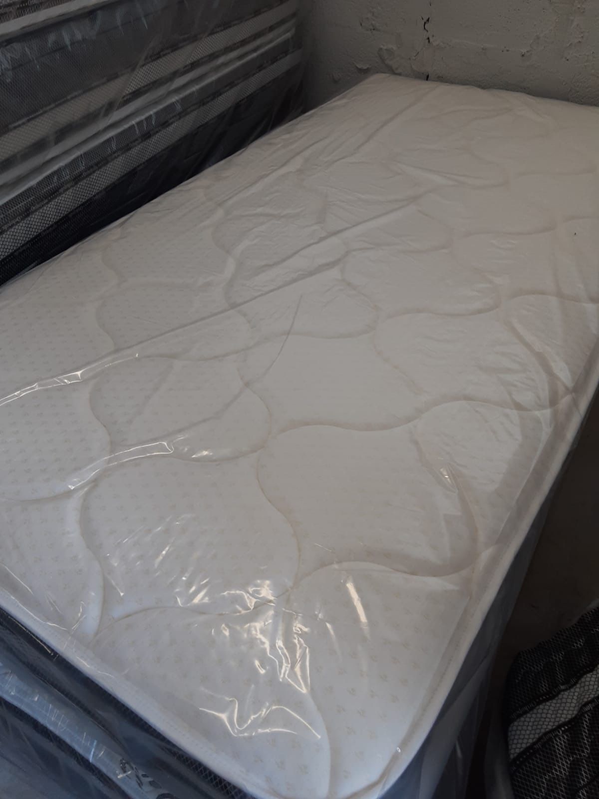 New twin mattress and box spring. Delivery available