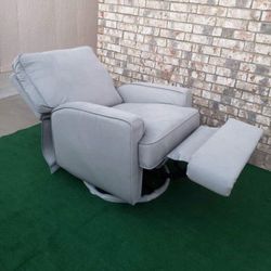 BRAND NEW - SWIVEL GLIDING RECLINER