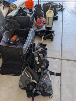 Scuba diving gear lot - BCD, Wetsuits, Fins, Booties, Tank and more
