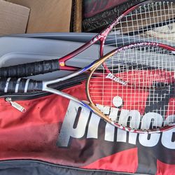 Two tennis rackets with bag
