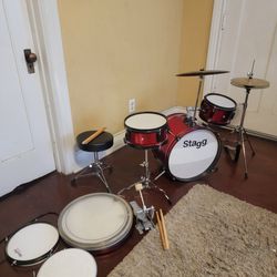 Stagg Junior Drum Set,Stool Seat,Snare Drum,Tom Tom,Bass Drum ,Hi-Hats And Cymbals,Stands,Pedals And Sticks Extra Accessories 