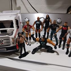 WWE action figures  and truck. Good condition. 