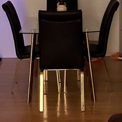 Glass Table and 4 Black & Gold Chairs 