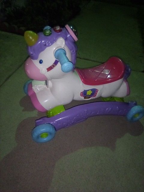 New V Tech Prance and rock learning unicorn with lights, colors and Songs. 