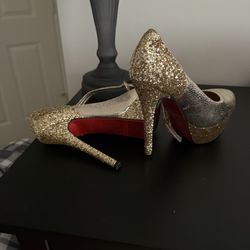 Selling gold Stiletto’s with red bottom
