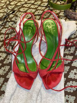 Late spade red heels